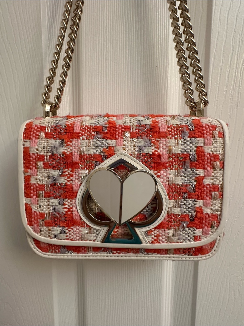 kate spade coral tweed crossbody with white trim and gold hardware